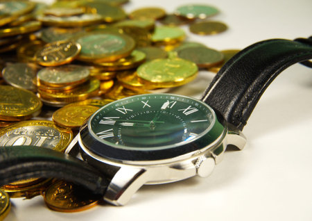 Concept time - money on a light backgroundの写真素材