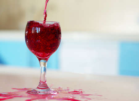 glass of red wine on the barの写真素材