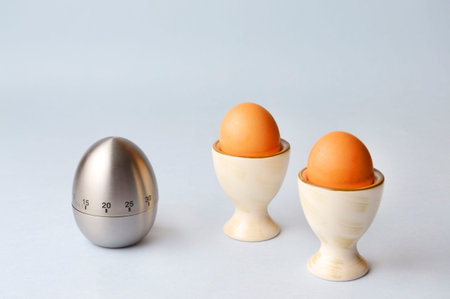 Egg timer and the boiled eggsの写真素材