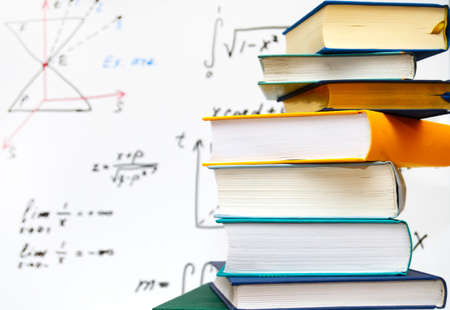 stack of books on magnetic board backgroundの写真素材