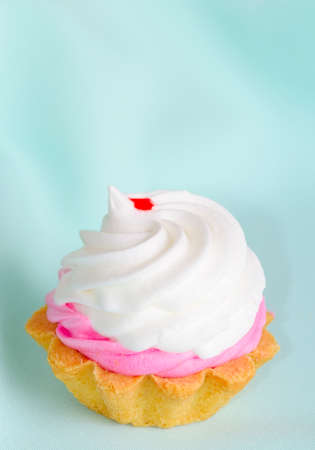 appetizing cake basket on a turquoise backgroundの写真素材