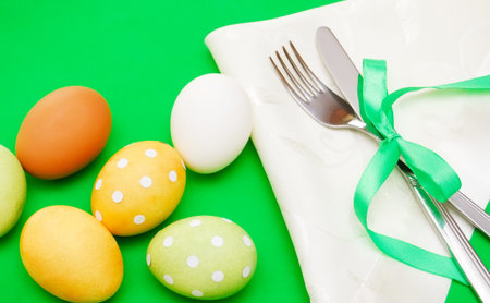 Easter decorations on the green background