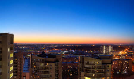 beautiful sunset and the city lightsの写真素材