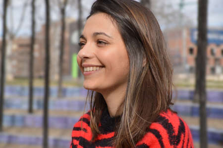 Portrait of smiling girl in the parkの写真素材