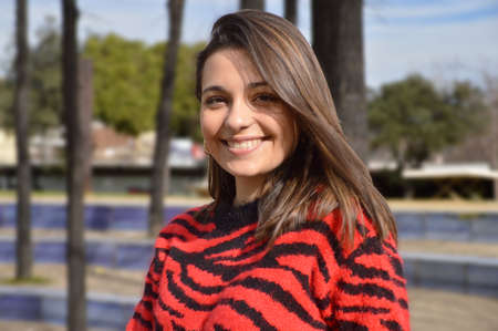 Young girlsimiling portrait in the parckの写真素材