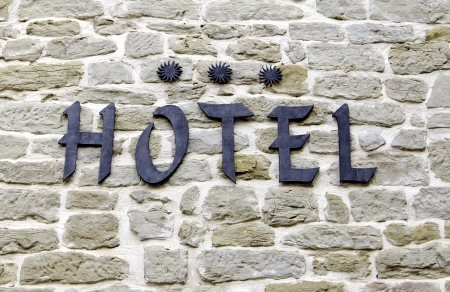 Hotel with a stone facade of luxury and design, architectural constructionの写真素材