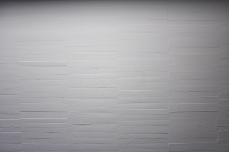 White brick wall with space for text, lightingの写真素材