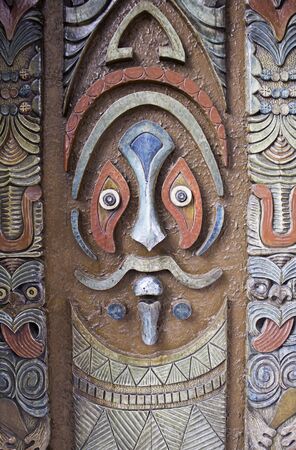 Art deco door with wooden carved facesの写真素材