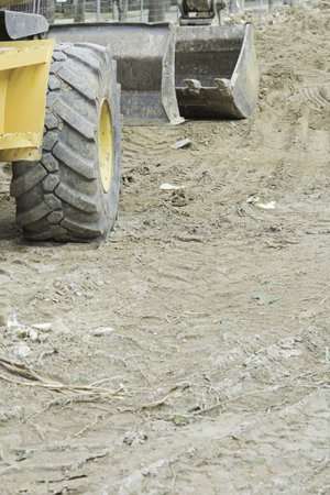 Work with crane in sandy soil, construction and architecture
