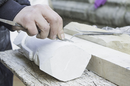 Sanding wood with lime in industrial workshopの写真素材