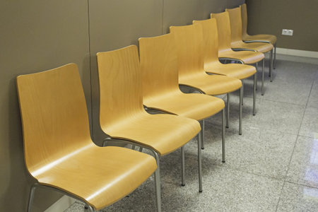 Wooden chairs in the waiting room, interior buildingの写真素材