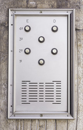 Door bell with silver buttons, input