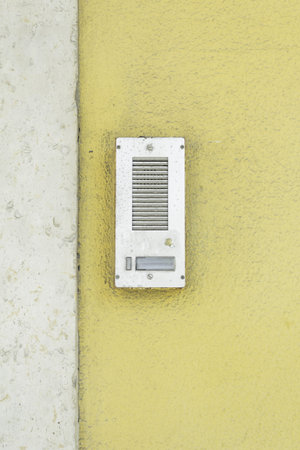 Door bell with silver buttons, input