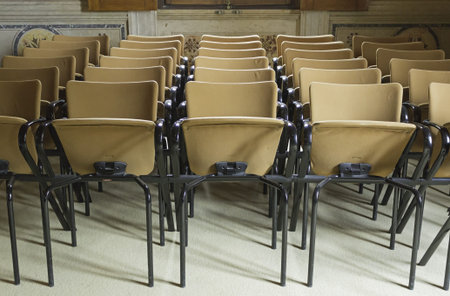 Event chairs stored inside buildingのeditorial素材