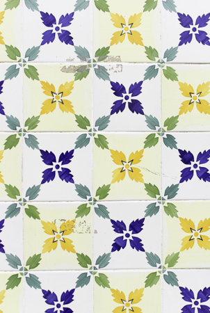 Yellow tiles in urban building, construction
