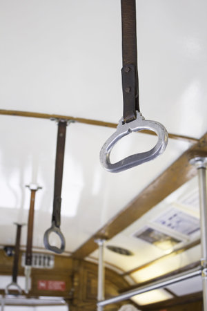 Securing indoor tram, public transportの写真素材