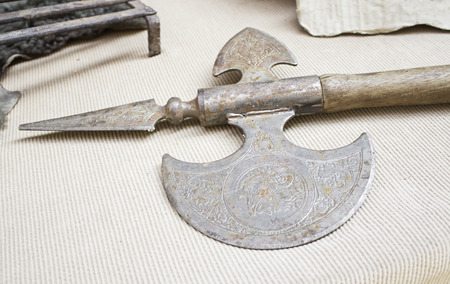 Sharp ax in medieval table, weapons and warの写真素材