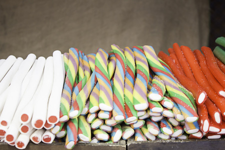 Licorice with different colored sugar, candyの写真素材