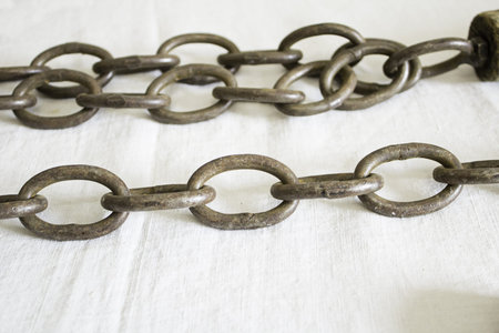 Rusty iron chains and old objects