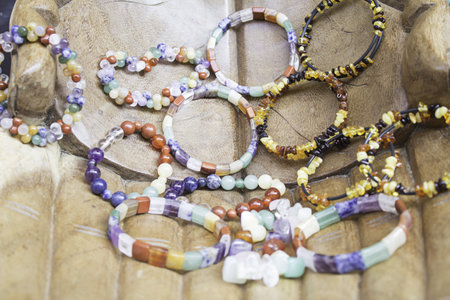 Bracelets colorful stones on craft marketの写真素材
