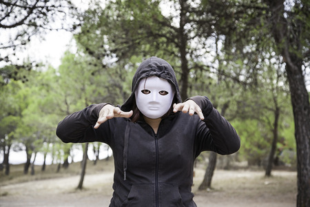 Forest hooded murderer, fear and halloweenの写真素材