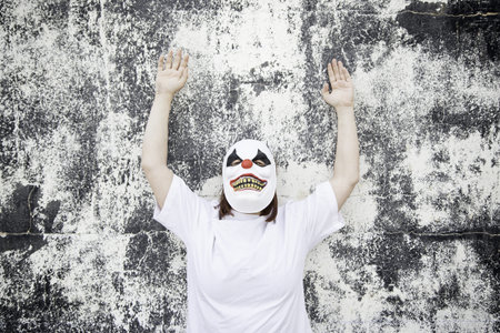 Crazy clown mask halloween costume and fear