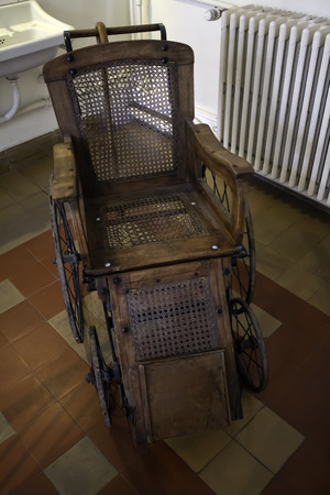 Old hospital wheelchair, chair detail for the disabledの写真素材