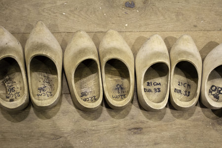 Dutch clogs craftsmen, manufacture of traditional footwear for the fieldの写真素材