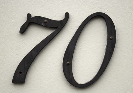 Number seventy in city street, symbol and addressの写真素材