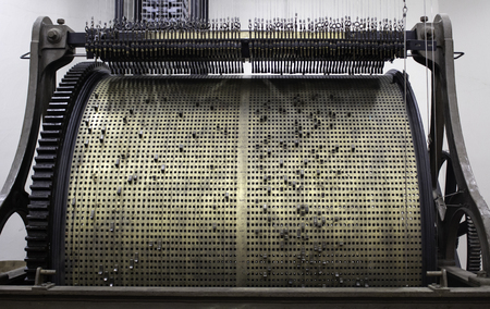 Old mechanism for music, detail of music in a large clockの写真素材