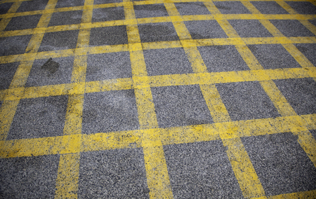 Yellow braking lines on the road, travel and transportationの写真素材