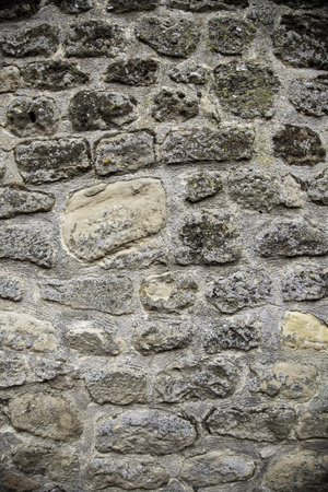 Stone wall in urban street, construction and architecture, textures