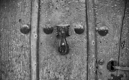 Aged wooden door knob, construction and architectureの写真素材
