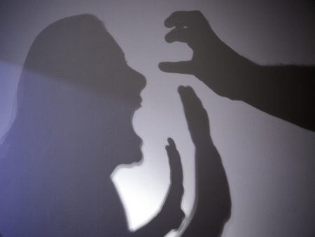 Shadows battered woman, gender violence and crime, symbolの写真素材