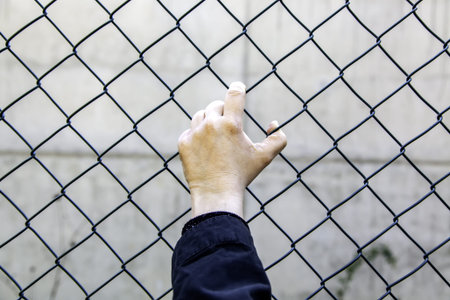Detail of despair and fear, arrest and crime, immigration