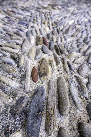 Pebble stones in natural park, geology and detail