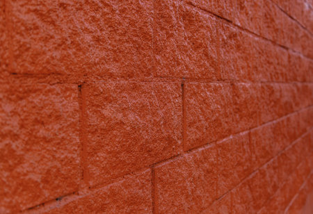 Red painted concrete block wall