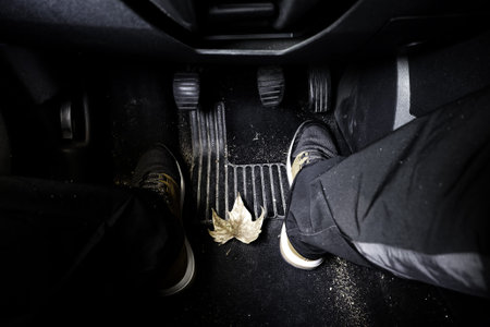Detail of young man driving, transportation