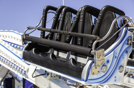 Detail of safety seats at a fair in the city