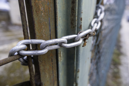 Security and protection chain on an old door, anti-theftの写真素材