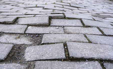 Detail of spoiled stone floor in the city, pedestrian streetの写真素材