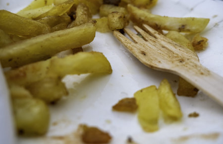 French fries plate in restaurant, fast unhealthy foodの写真素材