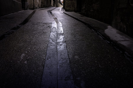 Detail of urban ground wet from the rainの写真素材