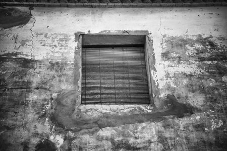 Detail of an old and abandoned facade in the city