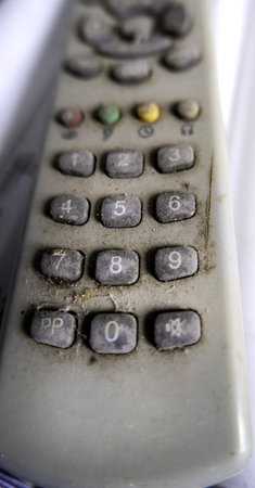 Detail of old television remote control, trashの写真素材