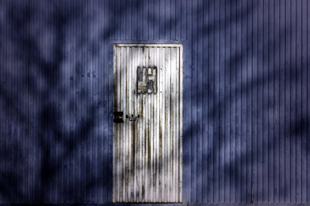 Detail of old metal door outside, protection and securityの写真素材