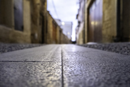 Detail of urban ground wet from the rainの写真素材