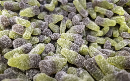 Detail of sweet gummy bears with sugar