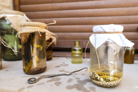 Detail of a glass jar with herbs