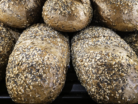 Artisanal whole grain seed bread in bakery, food and food